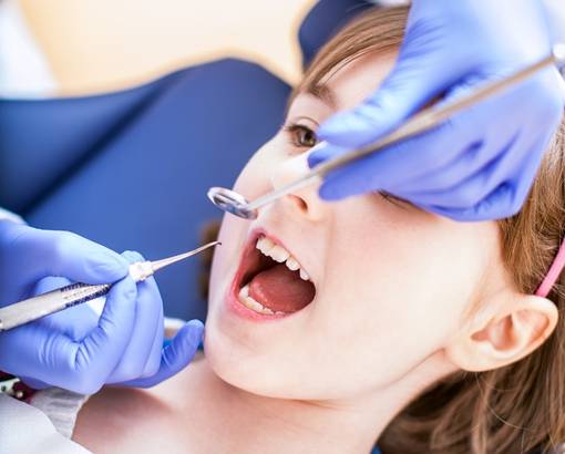 Dentist working on a child patient