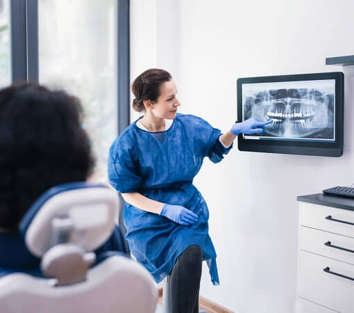 Dentist Explaining Tooth X-Rays